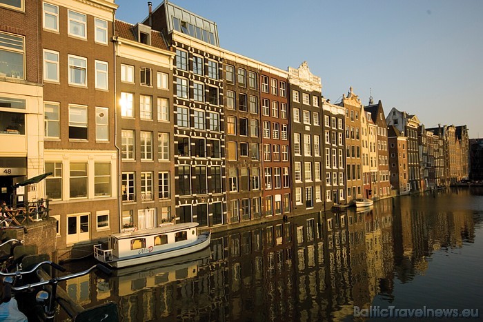 Amsterdamas kanālu sistēma ir pilsētbūves un arhitektūras meistardarbs, kas demonstrē Nīderlandes zelta laikmeta spožumu
Foto: Netherlands Board of T Amsterdamas kanālu sistēma ir pilsētbūves un arhitektūras meistardarbs, kas demonstrē Nīderlandes zelta laikmeta spožumu
Foto: Netherlands Board of T 52449